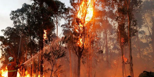 Conditions have eased in NSW where firefighters are trying to contain a devastating bushfire.
