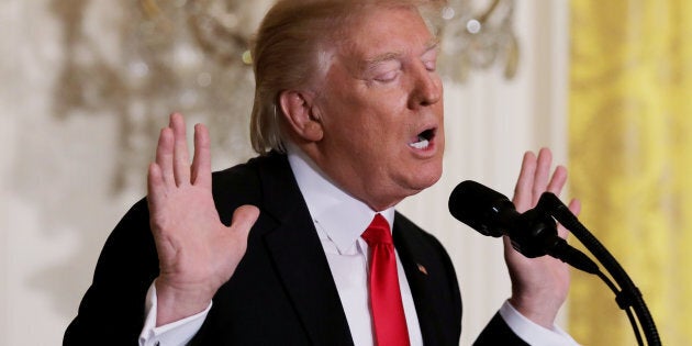 U.S. President Donald Trump reacts to a question from reporters during a lengthy news conference at the White House in Washington, U.S., February 16, 2017. REUTERS/Carlos Barria