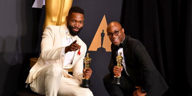 HOLLYWOOD, CA - FEBRUARY 26: Screenwriter Tarell Alvin McCraney (L) and filmmaker Barry Jenkins, winners of the award for Adapted Screenplay for 'Moonlight,' pose in the press room during the 89th Annual Academy Awards at Hollywood & Highland Center on February 26, 2017 in Hollywood, California. (Photo by Steve Granitz/WireImage)