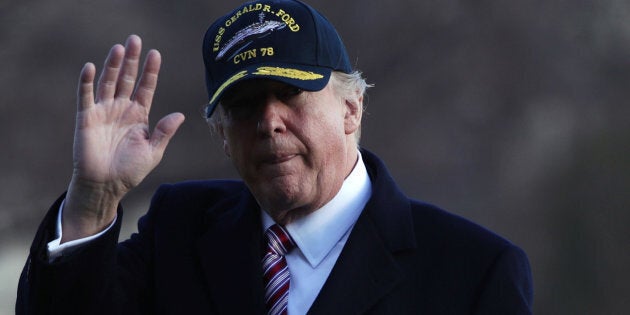 WASHINGTON, DC - MARCH 02: U.S. President Donald Trump waves as he walks on the South Lawn after he returned to the White House March 2, 2017 in Washington, DC. President Trump has returned from his trip to visit the USS Gerald R. Ford aircraft carrier in Newport News, Virginia. (Photo by Alex Wong/Getty Images)