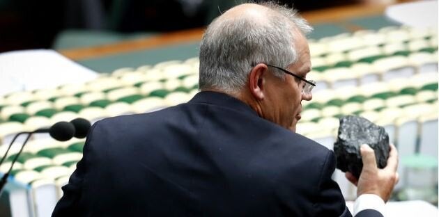 Federal Treasurer Scott Morrison brings a lump of coal to Question Time