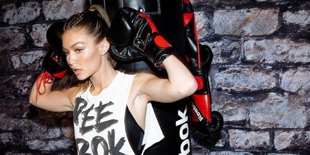 NEW YORK, NY - DECEMBER 07: Gigi Hadid leads a Self Defense Workout at Reebok And Gigi Hadid Present #PerfectNever Revolution, celebrating the next stage of the brand's #PerfectNever message which inspires women to challenge the notion of perfection as part of its Be More Human campaign on December 7, 2016 at Skylight at Clarkson Square in New York City. (Photo by Getty Images for Reebok)