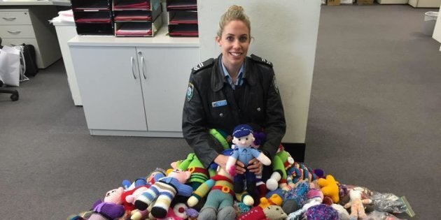 Leading Senior Constable Emma with the Trauma Teddies.