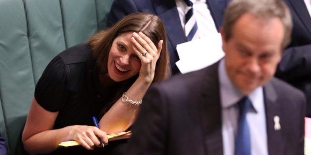 Kate Ellis reacts to an answer by Prime Minister Tony Abbott during question time at Parliament House in Canberra on Monday 24 November 2014