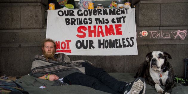 The homeless outside Flinders street, Melbourne