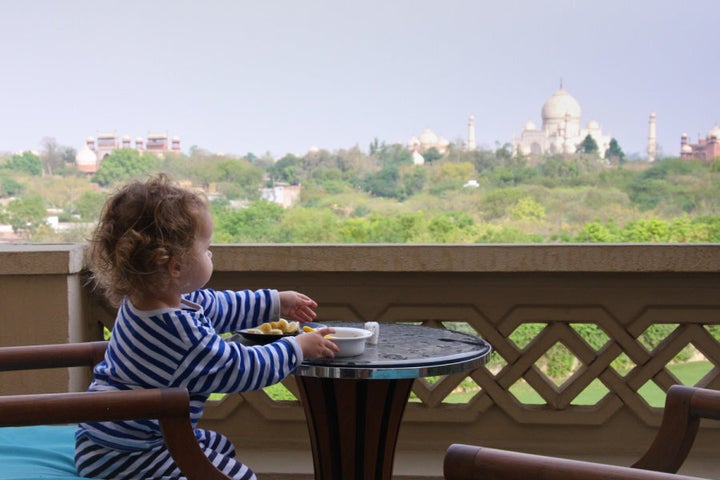 Gazing out towards the Taj Mahal, while enjoying chopped banana and oats.