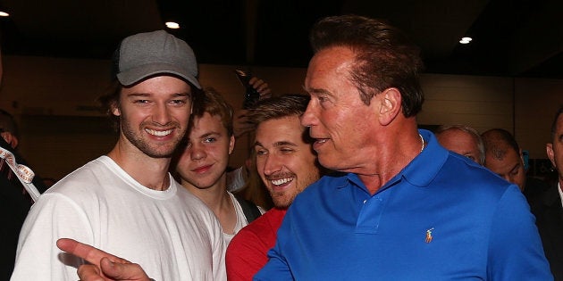 Arnold Schwarzenegger speaks with his son Patrick at the 2017 Arnold Classic in Melbourne.