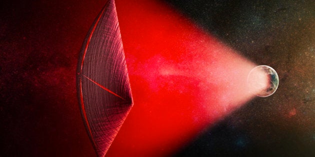 An artists illustration of a light-sail powered by a radio beam red generated on the surface of a planet The leakage from such beams as they sweep across the sky would appear as Fast Radio Bursts FRBs