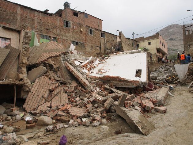 A mudslide destroyed homes in the town of Chosica, east of Lima. Almost 100,000 people have been made homeless since the flooding began in January.