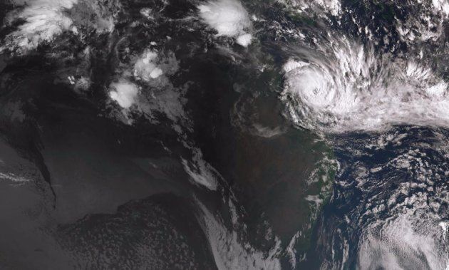 A satellite image of Cyclone Debbie of the coast of northern Queensland at 8:20am on Monday.