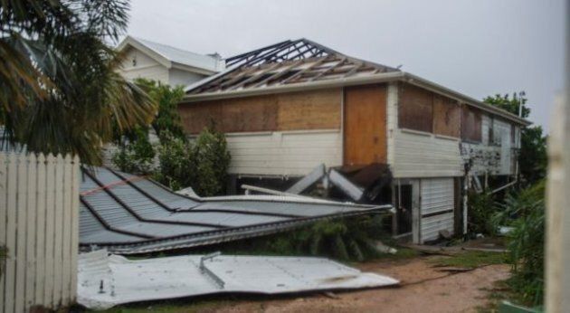 Cyclone Debbie has ripped the roof off this house in Bowen and relocated it to the front yard.