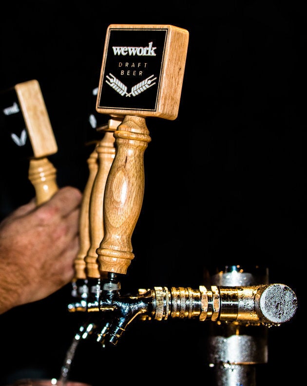 At WeWork, beer is on tap.