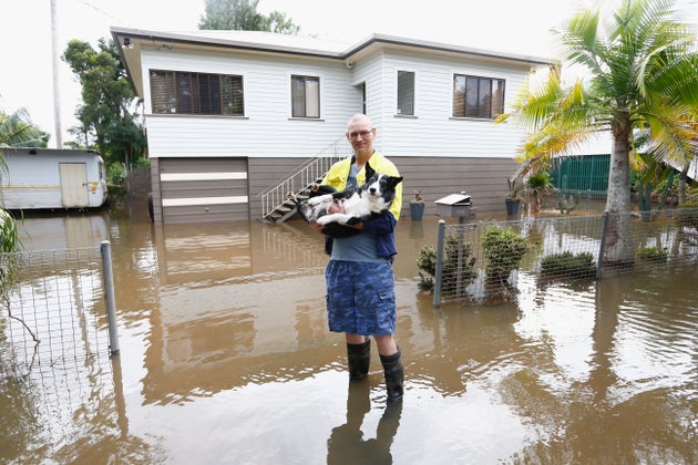 Lismore resident Michael with his dog ' Buddy' outside their house on April 1,
