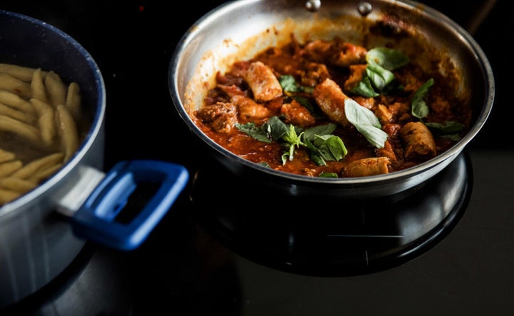 This ragù uses beef, pork spare ribs and pork and fennel sausages.