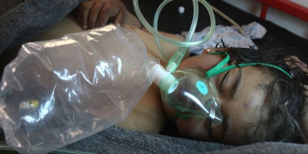 A Syrian child receives treatment following a suspected toxic gas attack in Khan Sheikhun on April 4.