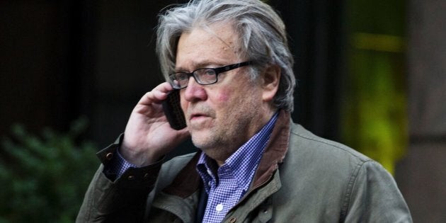 Steve Bannon, Chief Strategist for US President-elect Donald Trump, talks on the phone outside Trump Tower in New York on December 9, 2016. / AFP / DOMINICK REUTER (Photo credit should read DOMINICK REUTER/AFP/Getty Images)