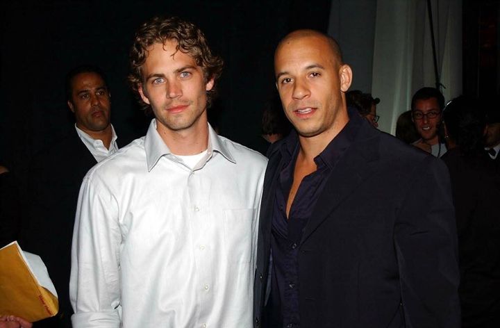 A younger Vin Diesel and Paul Walker.