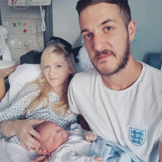 Charlie in hospital with his parents, Chris Gard and Connie Yates. The parents are fighting to take their terminally ill baby to America to try a treatment which isn't available in the UK.