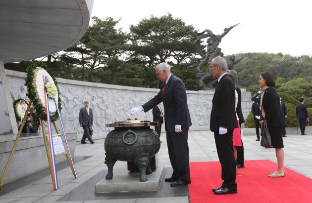 Vice President Mike Pence attends wreath-laying ceremony at the National Cemetery in Seoul.