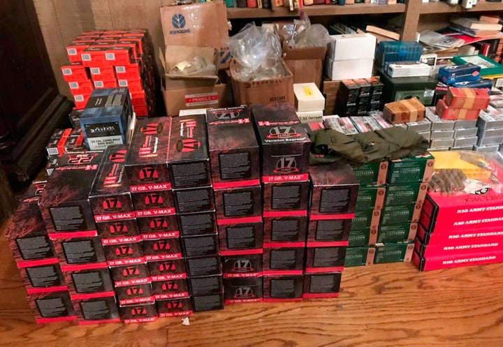 This photo provided by the Los Angeles Police Department shows gun parts and ammunition, part of a large cache of weapons sei