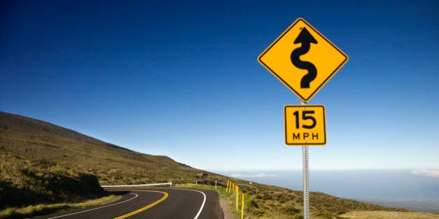 Curvy road sign in Haleakala National Park, Maui, Hawaii.