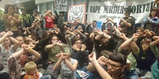 Protesters occupy an immigration building in Melbourne.