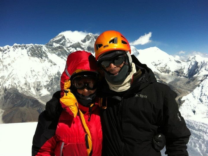 Di Westaway on the summit of Mt Ama Dablam, Nepal, with Everest in background