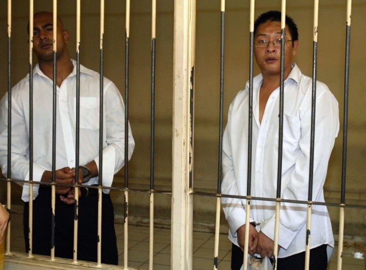 Australians Andrew Chan (R) and Myuran Sukumaran, pictured here inside a holding cell at a Denpasar court in 2006, were executed in April 2015 amid anger in Australia.