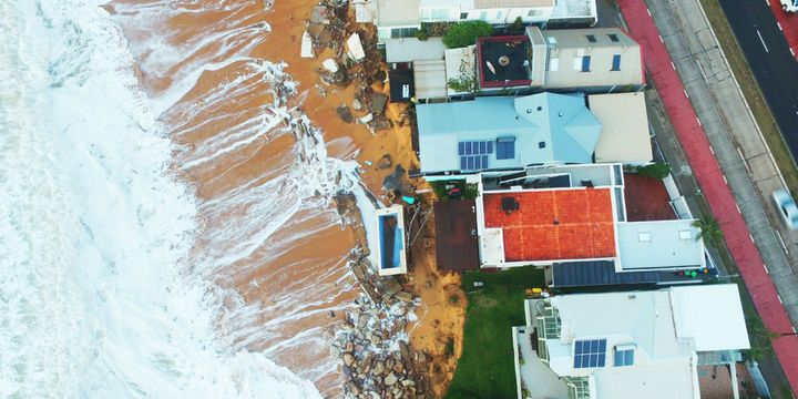Drone footage of destroyed homes.