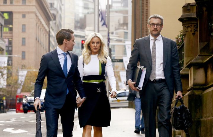 Oliver Curtis and wife Roxy Jacenko arrive at his insider trading trial on June 1.