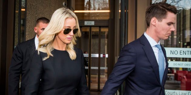 Oliver Curtis and Roxy Jacenko outside court.