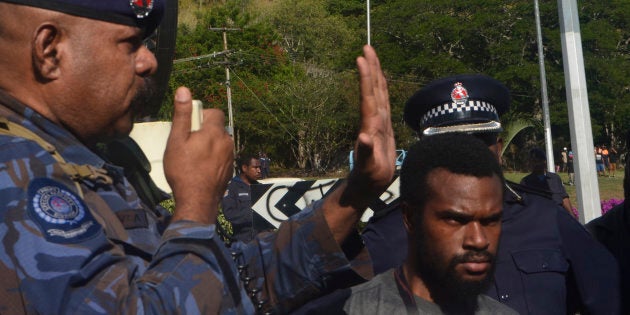 A moment captured during the June 8 protest in port Moresby. Police opened fire on marching students.