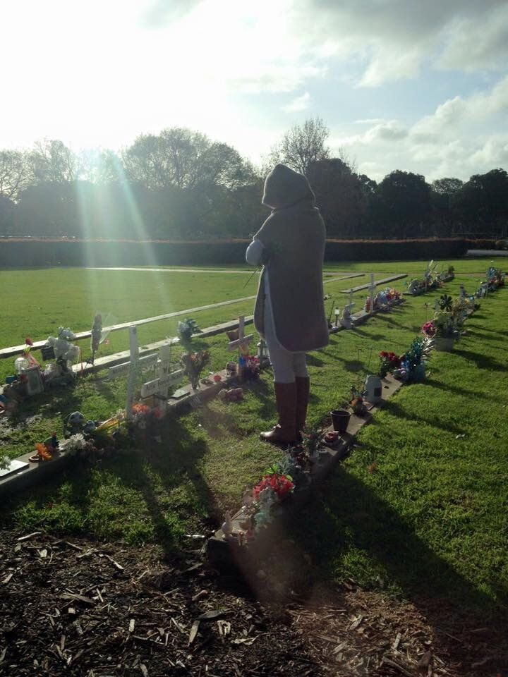 Claire visits daughter Alfie's grave.