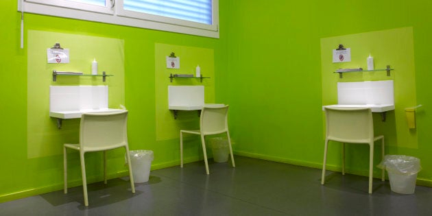 Individual tables inside a safe injection site called Quai 9 near Geneva main train station October 14, 2010.