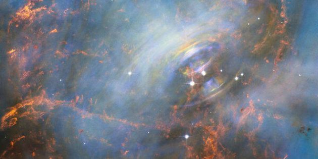 The Hubble Space Telescope's spectacular image of the Crab Nebula. Spinning 30 times a second, the neutron star shoots out detectable beams of energy that make it look like it’s pulsating, according to NASA.