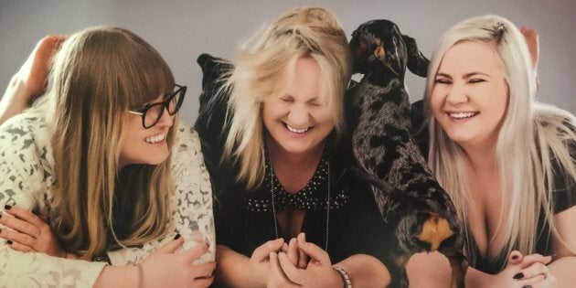 Jessica Cameron, left, with her sister Ebony and mum Joanne who have both supported her choice to leave a lucrative career in law to start her online pet accessories business.