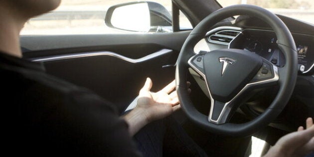 New Autopilot features are demonstrated in a Tesla Model S during a Tesla event in Palo Alto, California October 14, 2015. REUTERS/Beck Diefenbach