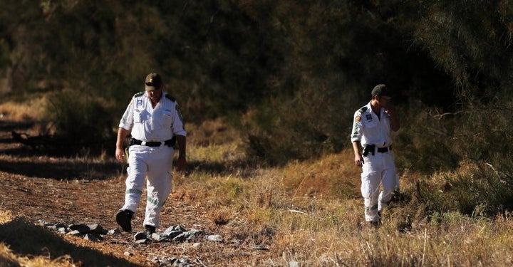 Leeton Volunteer Rescue members search for the body of murdered school teacher Stephanie Scott.