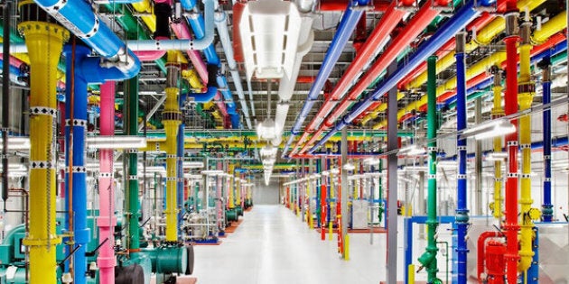 This undated photo provided by Google shows a Google data center in in Douglas Country, Ga. Google is opening a virtual window into the secretive data centers that serve as its nerve center. The unprecedented peek is being provided through a new website unveiled Wednesday, Oct. 17, 2012. The site features photos from inside some of the eight data centers that Google Inc. already has running in the U.S., Finland and Belgium. (AP Photo/Google)