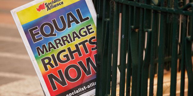 Protesters gathered outside Sydney Town Hall in support of marriage equality.