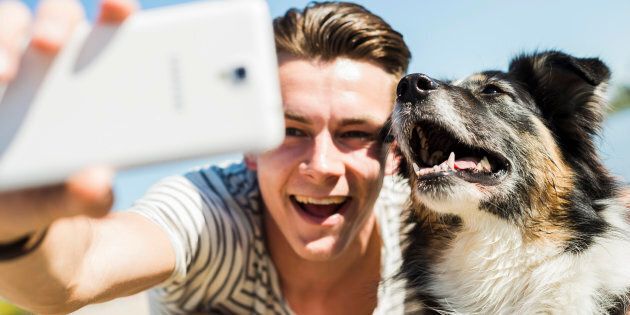 We love our pets so much we even include them in our selfies.