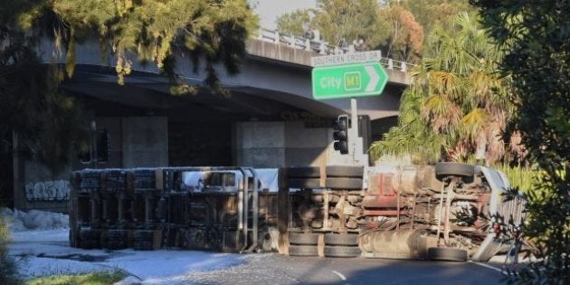 A delicate clean-up operation is taking place after a fuel truck crashed in Sydney.