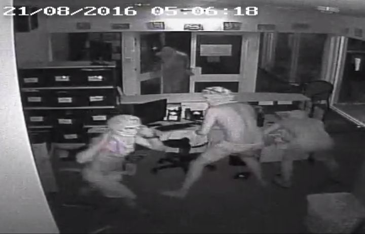 CCTV footage showing four men inside the school