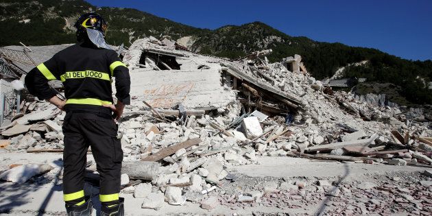 Collapsed houses are seen following an earthquake in Pescara del Tronto, central Italy, August 26, 2016. REUTERS/Max Rossi
