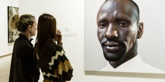 Sydney artist Nick Stathopoulos spent four months painting the Sudanese refugee.