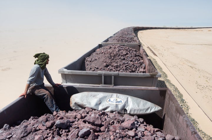 Jody MacDonald's mesmerising image of her brother Ken MacDonald sitting atop a train during their adventure through the Sahara Desert.