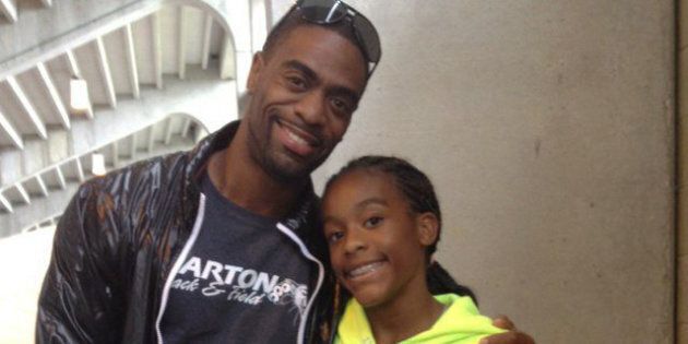 Sprinter Tyson Gay with daughter, Trinity Gay