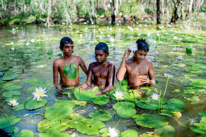 Boys in the Swimming Hole Mornington Island by El Hogan