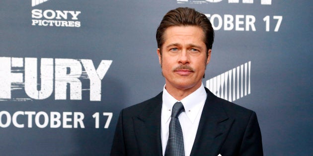 Cast member Brad Pitt arrives on the red carpet at the premiere of World War II film