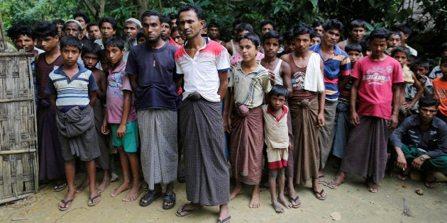 Rohingya Muslim men stand at U Shey Kya village outside Maugndaw in Rakhine state, Myanmar October 27, 2016.